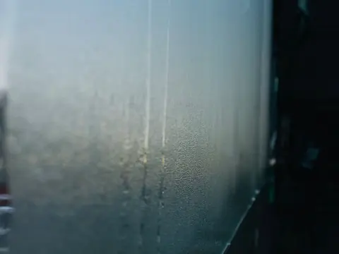 Hazy, clouded glass with light coming through it
