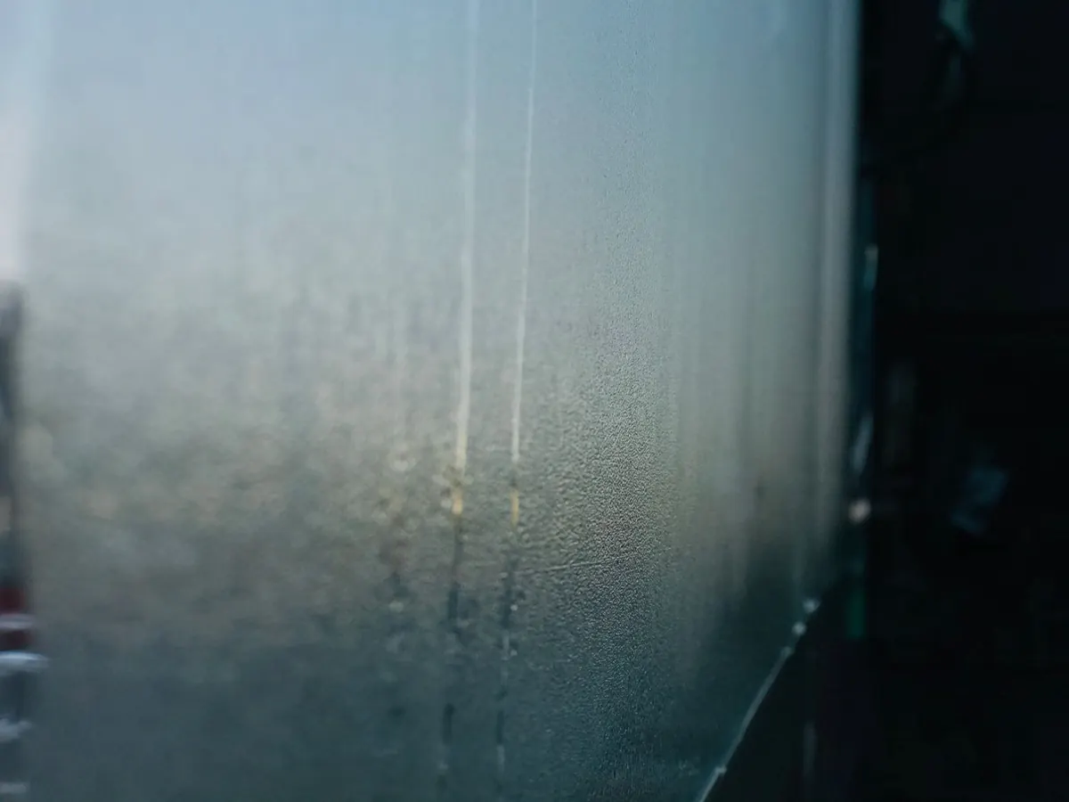 Hazy, clouded glass with light coming through it
