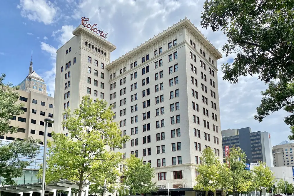 The white terra-cotta Colcord Hotel at Robinson and Sheridan in downtown Oklahoma City